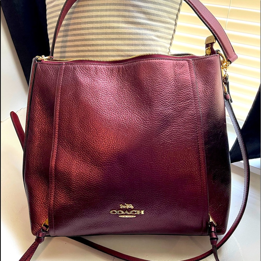 Beautiful metallic burgundy Coach bag. Great bag.